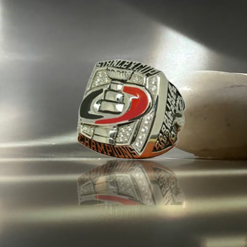 Red and black championship ring